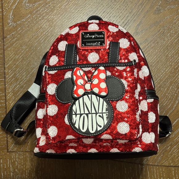 Loungefly Handbags - Loungefly Disney Minnie Mouse Sequin Red and White Backpack with Ear Holder